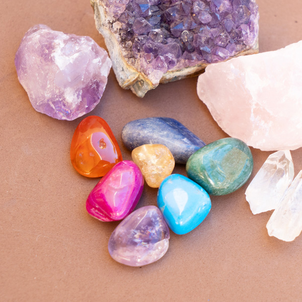 Healing crystals on brown background